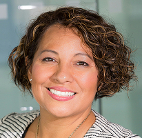 Portrait of Claire Ashford, head of compliance, in the context of financial regulation